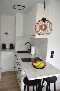 A cozinha ou kitchenette de A2Apartment - 1-Zimmer-Apartment nähe Playmobil