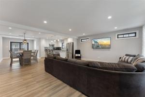 a living room with a couch and a dining room at 303 E Nashville Ave in Wildwood Crest