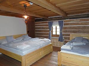 Postel nebo postele na pokoji v ubytování Zoopark Chomutov