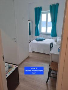 Een bed of bedden in een kamer bij Albergo Barbara