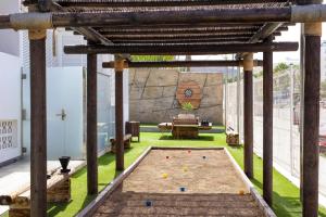 an outdoor play area with a trampoline at Alexandre La Siesta in Playa de las Americas
