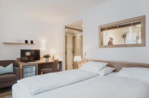 Posteľ alebo postele v izbe v ubytovaní Romantik Spa Hotel Elixhauser Wirt