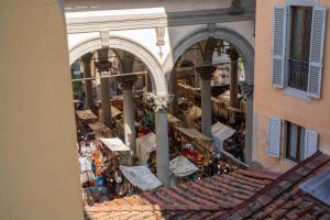 an overhead view of a market in a building at Residenza degli Speziali in Florence