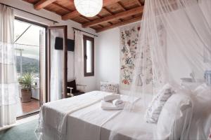 Posteľ alebo postele v izbe v ubytovaní Cretan Magnolia Gem - Smari Cozy Getaway
