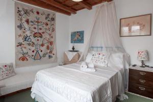 Posteľ alebo postele v izbe v ubytovaní Cretan Magnolia Gem - Smari Cozy Getaway