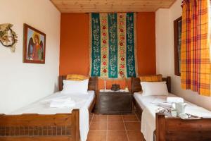 Posteľ alebo postele v izbe v ubytovaní Cretan Magnolia Gem - Smari Cozy Getaway