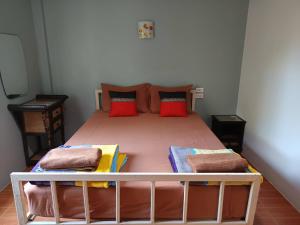 Postel nebo postele na pokoji v ubytování Chandra Hostel Koh Tao