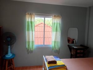 Postel nebo postele na pokoji v ubytování Chandra Hostel Koh Tao