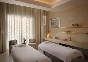Postel nebo postele na pokoji v ubytování Four Seasons Resort and Residences at The Pearl - Qatar + 32 fotografií