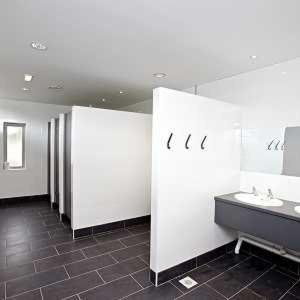 a bathroom with two sinks and two stalls at Ghyll Shepherd's Hut in Rydal