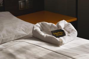 Postel nebo postele na pokoji v ubytování Hotel Westbahn