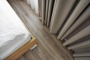 Postel nebo postele na pokoji v ubytování Hotel Westbahn