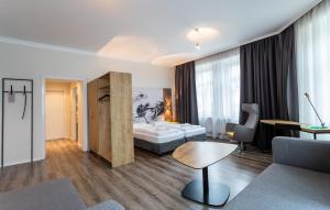 Postel nebo postele na pokoji v ubytování Hotel Westbahn