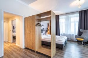 Postel nebo postele na pokoji v ubytování Hotel Westbahn