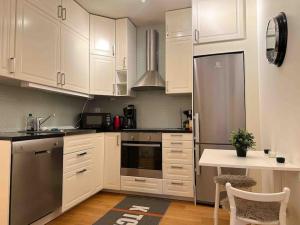 Η κουζίνα ή μικρή κουζίνα στο Stay Inn Apartment Rörstrandsgatan