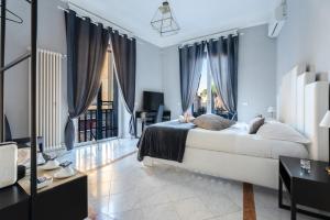 Χώρος καθιστικού στο Compasso Suites
