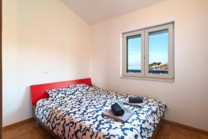 Ένα ή περισσότερα κρεβάτια σε δωμάτιο στο Apartman Katarina