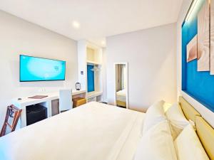 Voodi või voodid majutusasutuse Hotel l'Approdo toas