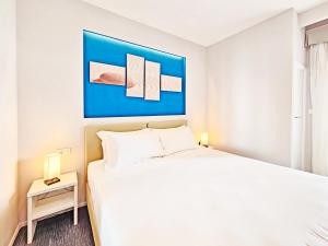 Voodi või voodid majutusasutuse Hotel l'Approdo toas