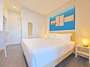 Voodi või voodid majutusasutuse Hotel l'Approdo toas