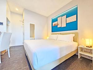 Voodi või voodid majutusasutuse Hotel l'Approdo toas