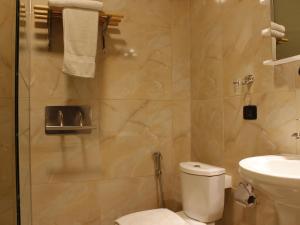 Koupelna v ubytování Viccini Suites + 37 fotografií