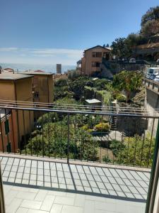 a balcony with a view of a garden at Casa Patrizia in Monterosso al Mare