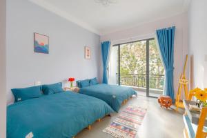 Postel nebo postele na pokoji v ubytování Kim Little Hotel Dalat