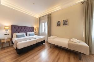 Posteľ alebo postele v izbe v ubytovaní Hotel Real Segovia by Recordis Hotels