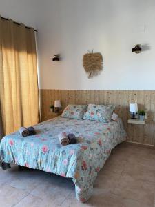 Postel nebo postele na pokoji v ubytování Hostal Espai Mediterrani