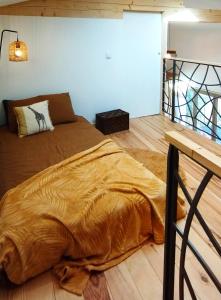Llit o llits en una habitació de Maison avec hammam privé en option - Maison Mandala