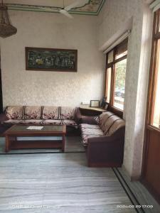 Zona de estar de Hotel Surbhi palace