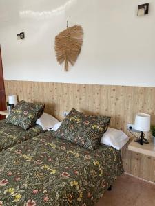 Postel nebo postele na pokoji v ubytování Hostal Espai Mediterrani