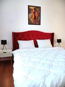 Postel nebo postele na pokoji v ubytování Bella Casa - ApartHotel