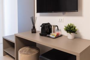 TV a/nebo společenská místnost v ubytování Luxury Station Suite