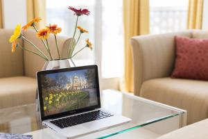Televízia a/alebo spoločenská miestnosť v ubytovaní Vienna Grand Apartments DANUBE