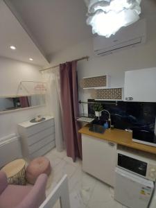 Kuchyň nebo kuchyňský kout v ubytování Barko rooms + 25 fotografií