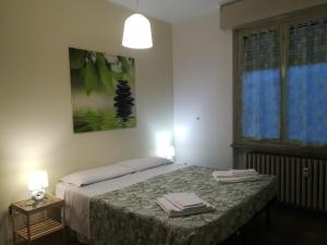 Katil atau katil-katil dalam bilik di DaNicolas Novara Apartment