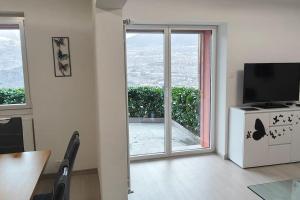 Televisyen dan/atau pusat hiburan di Logement Premium à Salins