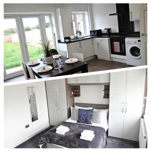 a living room and a kitchen with a bed in it at The Hatton Rooms in New Bedfont