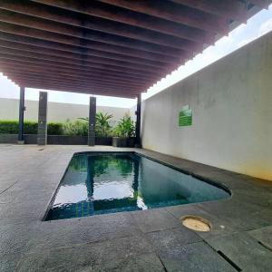 Kolam renang di atau dekat dengan Apt Serpong Garden Studio With Pool and Wi-Fi