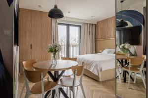 Postel nebo postele na pokoji v ubytování AVAPARTS Apartament FAMILY