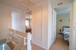 a room with a staircase leading to a bedroom at Pass the Keys Stylish 3 bedroom home with free parking in Nottingham