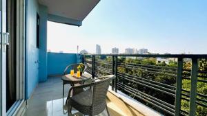 Balkón nebo terasa v ubytování ZEN Suites - Golf Course Road Gurgaon