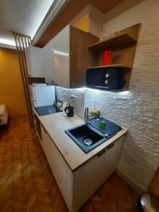Kuchyň nebo kuchyňský kout v ubytování G&S apartment