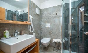 Koupelna v ubytování Hotel Aida