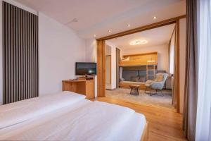 Telewizja i/lub zestaw kina domowego w obiekcie Familien- & Vitalhotel Auenhof