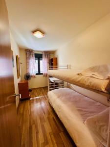 Postel nebo postele na pokoji v ubytování Bonito Apartamento en Ainsa