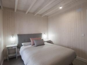 A bed or beds in a room at Casas Guemon