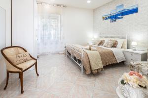 Postel nebo postele na pokoji v ubytování B&B VESUVIAN STONE